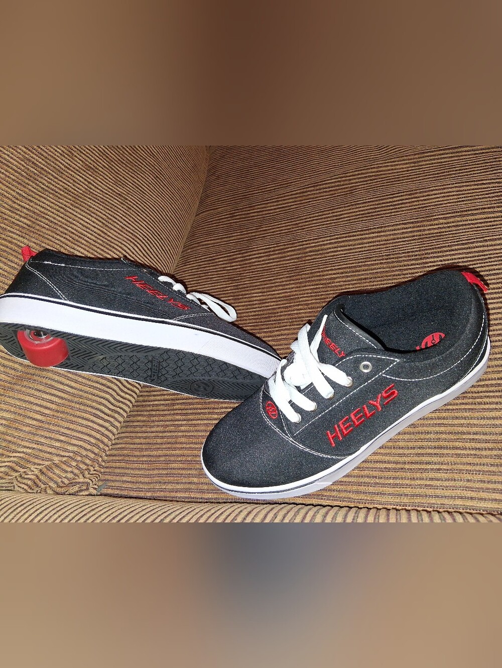 Heelys for Men Wheeled Sneakers Black Canvas  with Red Accents.